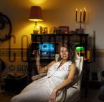 07-07-2004 Frederique Huydts at home in Amterdam, by order of Pulse Magazine. July 07, 2004.

[keywords]Posed, Half Length, Eye Contact, Smiling, Chair, Candles[/keywords]